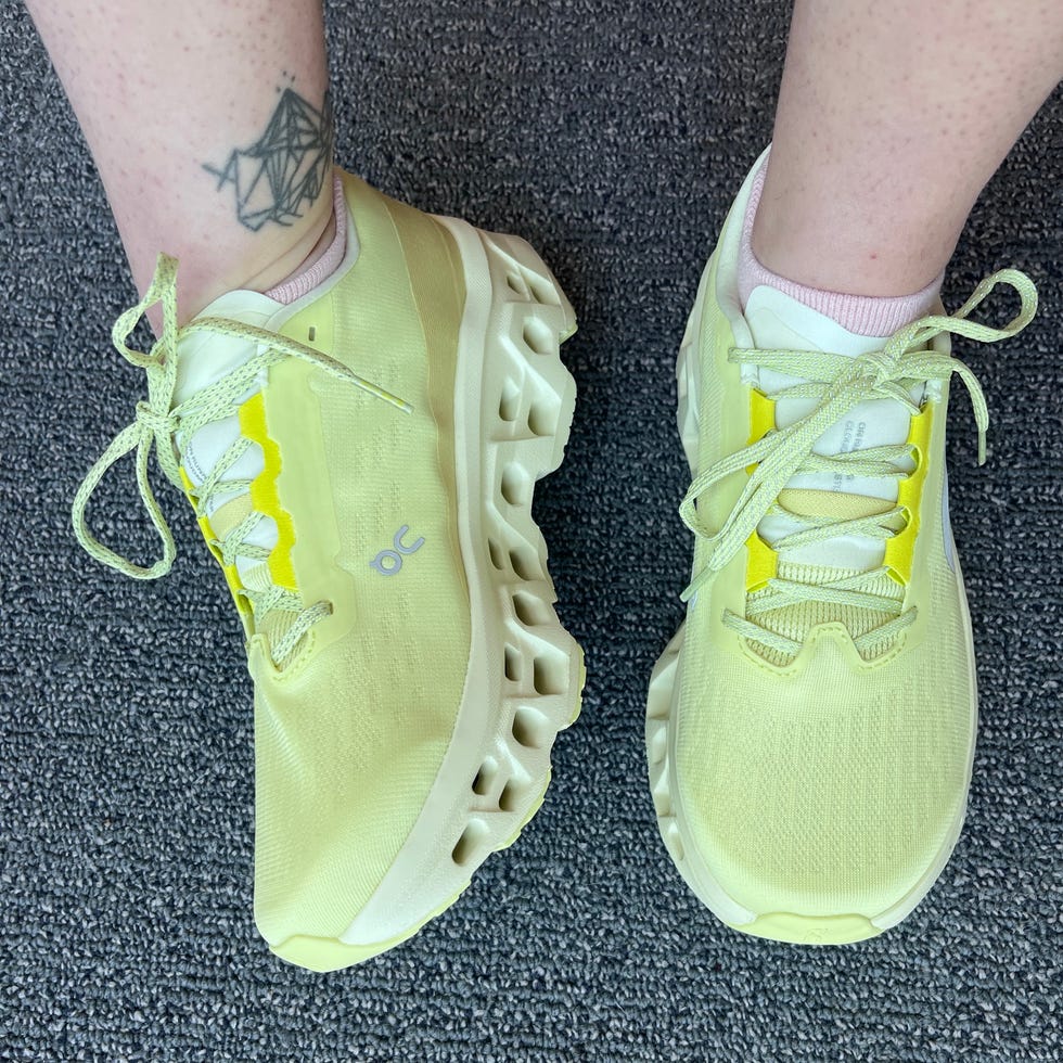 Sporty footwear displayed on a surface. Sporty footwear displayed on a surface.